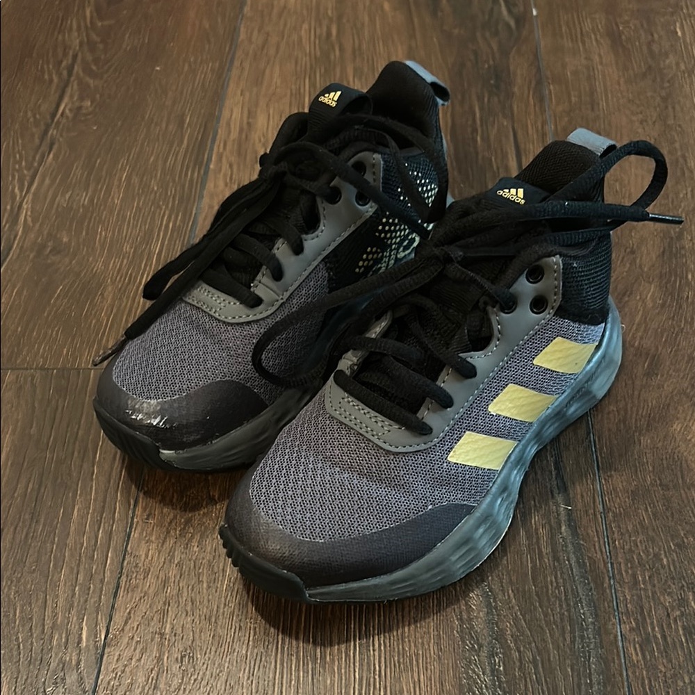 Adidas Black and Gray Shoes with Gold Accents